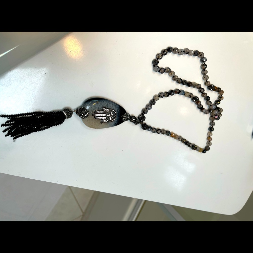 Gorgeous stone and crystal hand of God necklace